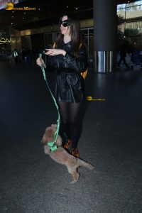 actress Giorgia Andriani with her cute dog at mumbai airport