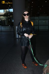actress Giorgia Andriani with her cute dog at mumbai airport