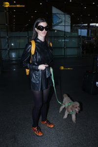 actress Giorgia Andriani with her cute dog at mumbai airport