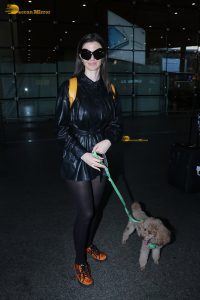 actress Giorgia Andriani with her cute dog at mumbai airport