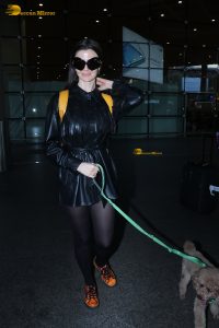 actress Giorgia Andriani with her cute dog at mumbai airport
