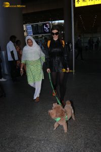actress Giorgia Andriani with her cute dog at mumbai airport