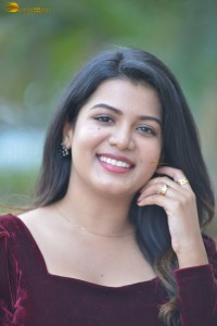 actres goldie nissy photoshoot in a maroon velvet top