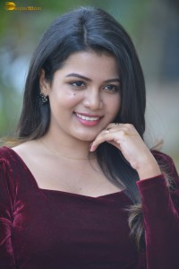 actres goldie nissy photoshoot in a maroon velvet top