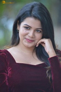 actres goldie nissy photoshoot in a maroon velvet top