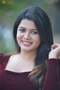 actres goldie nissy photoshoot in a maroon velvet top