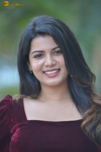 actres goldie nissy photoshoot in a maroon velvet top