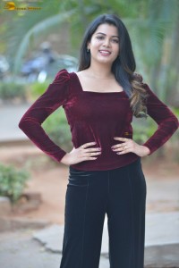 actres goldie nissy photoshoot in a maroon velvet top