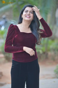 actres goldie nissy photoshoot in a maroon velvet top