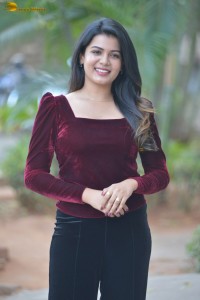 actres goldie nissy photoshoot in a maroon velvet top