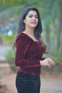 actres goldie nissy photoshoot in a maroon velvet top