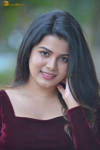 actres goldie nissy photoshoot in a maroon velvet top