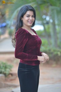 actres goldie nissy photoshoot in a maroon velvet top