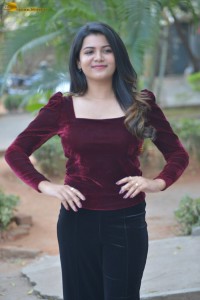 actres goldie nissy photoshoot in a maroon velvet top