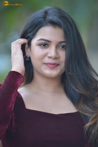 actres goldie nissy photoshoot in a maroon velvet top