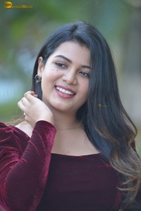 actres goldie nissy photoshoot in a maroon velvet top