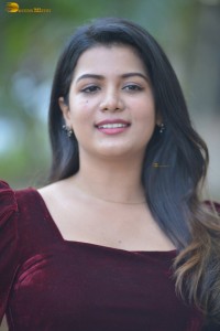 actres goldie nissy photoshoot in a maroon velvet top