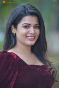 actres goldie nissy photoshoot in a maroon velvet top