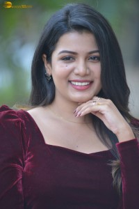 actres goldie nissy photoshoot in a maroon velvet top