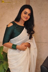 actress Gopika Udayan cute in a white saree