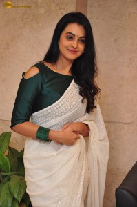actress Gopika Udayan cute in a white saree