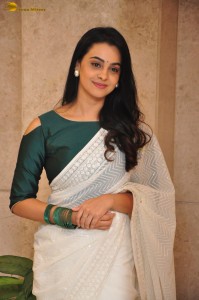 actress Gopika Udayan cute in a white saree