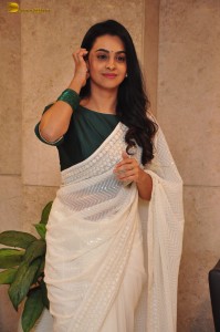 actress Gopika Udayan cute in a white saree