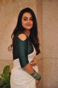 actress Gopika Udayan cute in a white saree