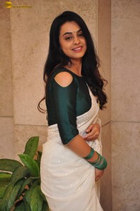 actress Gopika Udayan cute in a white saree