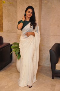 actress Gopika Udayan cute in a white saree