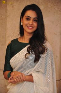 actress Gopika Udayan cute in a white saree