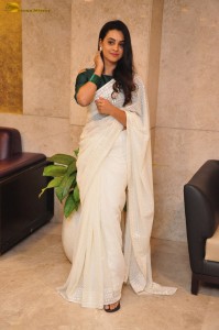 actress Gopika Udayan cute in a white saree