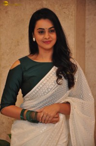 actress Gopika Udayan cute in a white saree