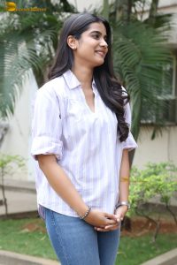 tollywood actress sri gouri priya beautiful in a white shirt and blue denim jeans