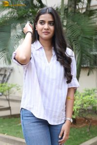 tollywood actress sri gouri priya beautiful in a white shirt and blue denim jeans