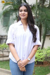 tollywood actress sri gouri priya beautiful in a white shirt and blue denim jeans