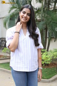 tollywood actress sri gouri priya beautiful in a white shirt and blue denim jeans