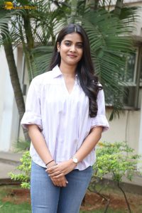 tollywood actress sri gouri priya beautiful in a white shirt and blue denim jeans