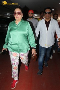 Bollywood actor govinda and his wife sunita ahuja at airport