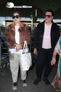 Bollywood Superstar Govinda Surprised by Photographers with a Birthday Cake at Airport on December 20