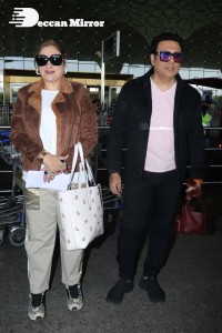 Bollywood Superstar Govinda Surprised by Photographers with a Birthday Cake at Airport on December 20