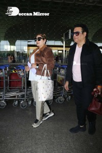 Bollywood Superstar Govinda Surprised by Photographers with a Birthday Cake at Airport on December 20