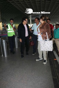 Bollywood Superstar Govinda Surprised by Photographers with a Birthday Cake at Airport on December 20