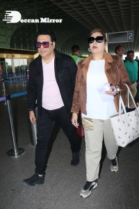 Bollywood Superstar Govinda Surprised by Photographers with a Birthday Cake at Airport on December 20