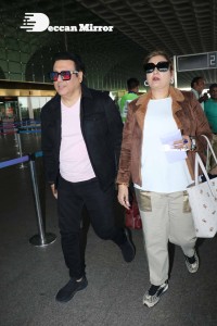 Bollywood Superstar Govinda Surprised by Photographers with a Birthday Cake at Airport on December 20
