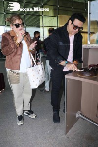 Bollywood Superstar Govinda Surprised by Photographers with a Birthday Cake at Airport on December 20
