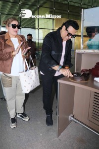 Bollywood Superstar Govinda Surprised by Photographers with a Birthday Cake at Airport on December 20