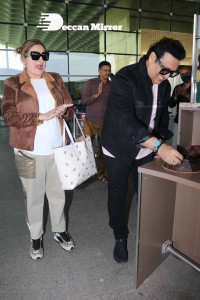 Bollywood Superstar Govinda Surprised by Photographers with a Birthday Cake at Airport on December 20