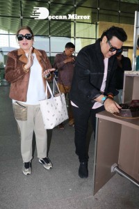 Bollywood Superstar Govinda Surprised by Photographers with a Birthday Cake at Airport on December 20