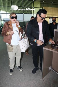 Bollywood Superstar Govinda Surprised by Photographers with a Birthday Cake at Airport on December 20